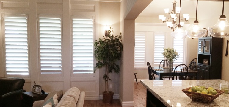 Boston shutters in dining room and living room